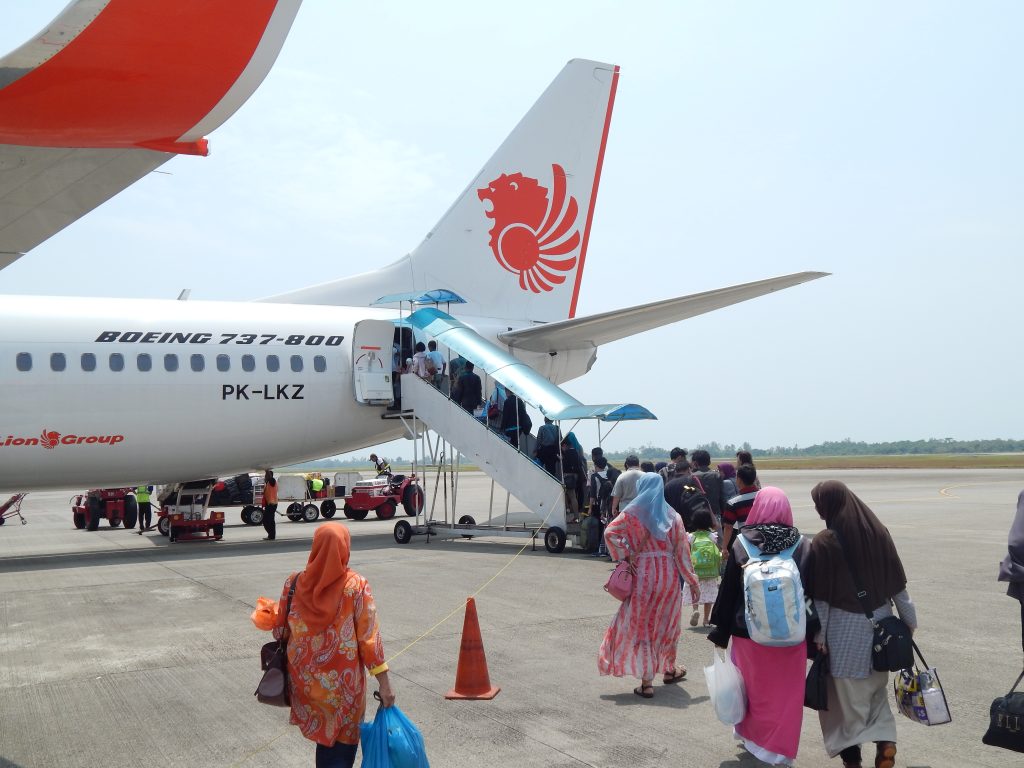 People boarding the airplane of Lion Air at Minangkabau international airport