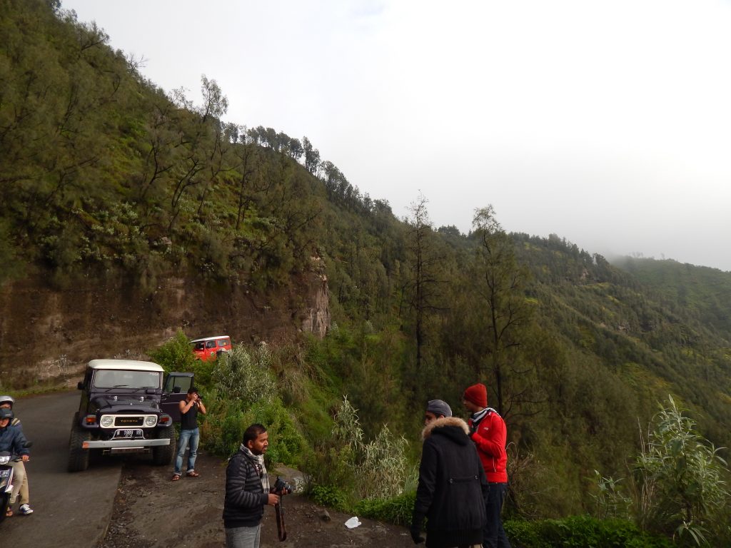 Tourists leaving their jeeps to take some pictures at Mount Bromo