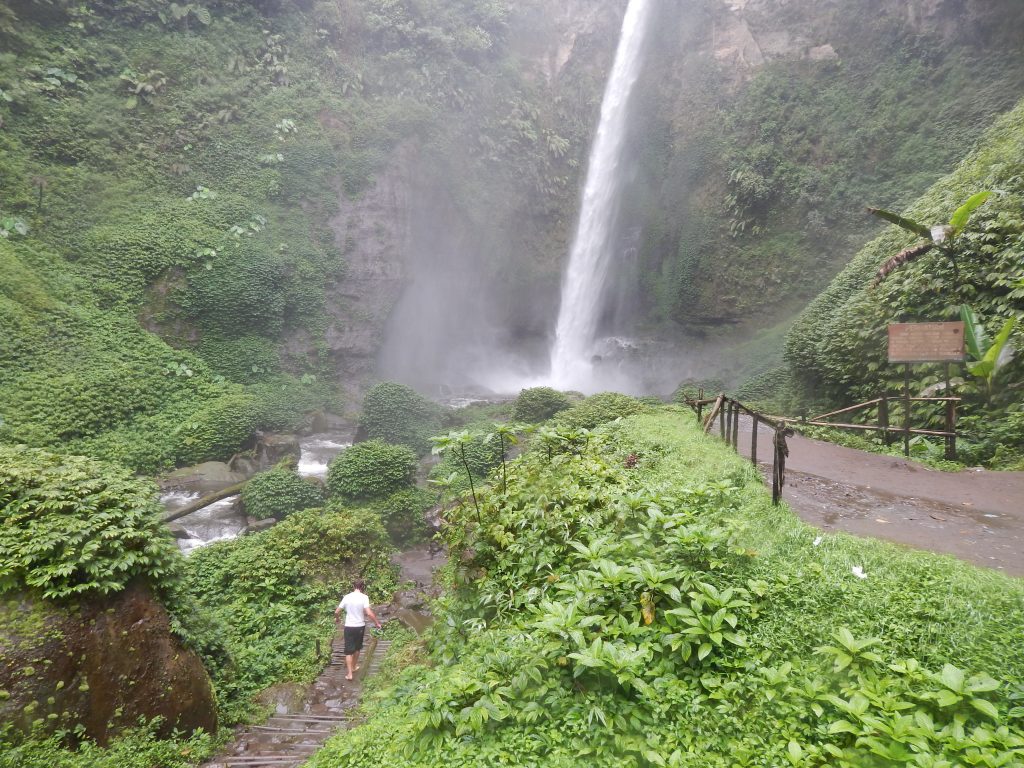 The downpour at Rainbow Waterfall