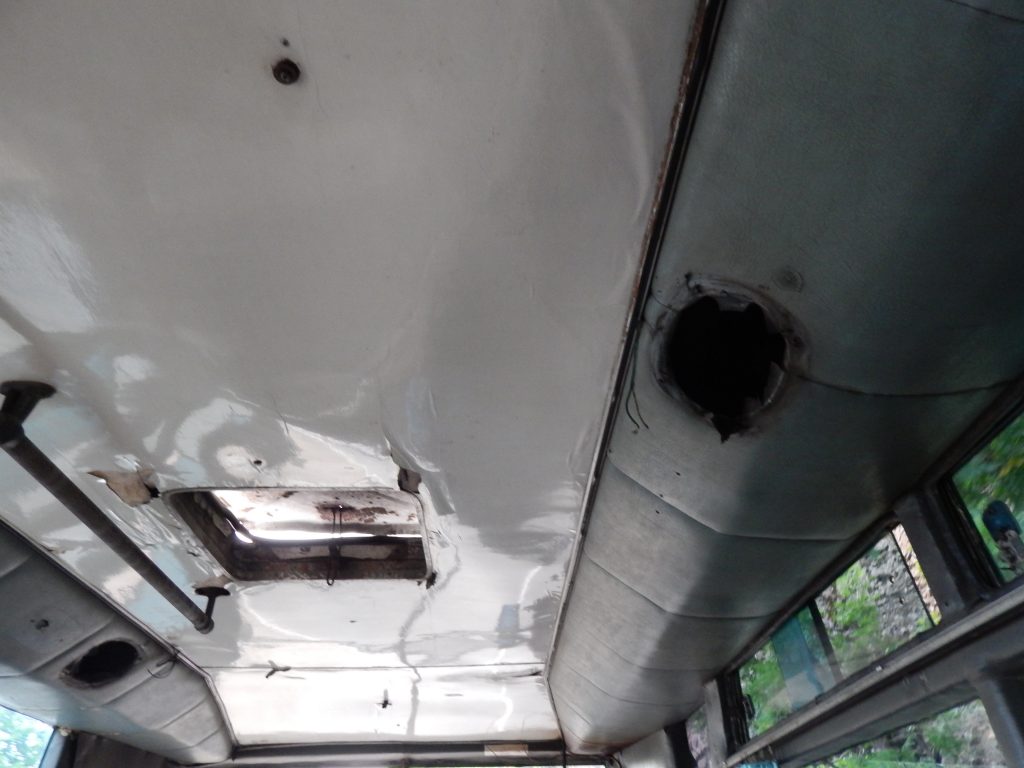 Torn down public bus in Bali