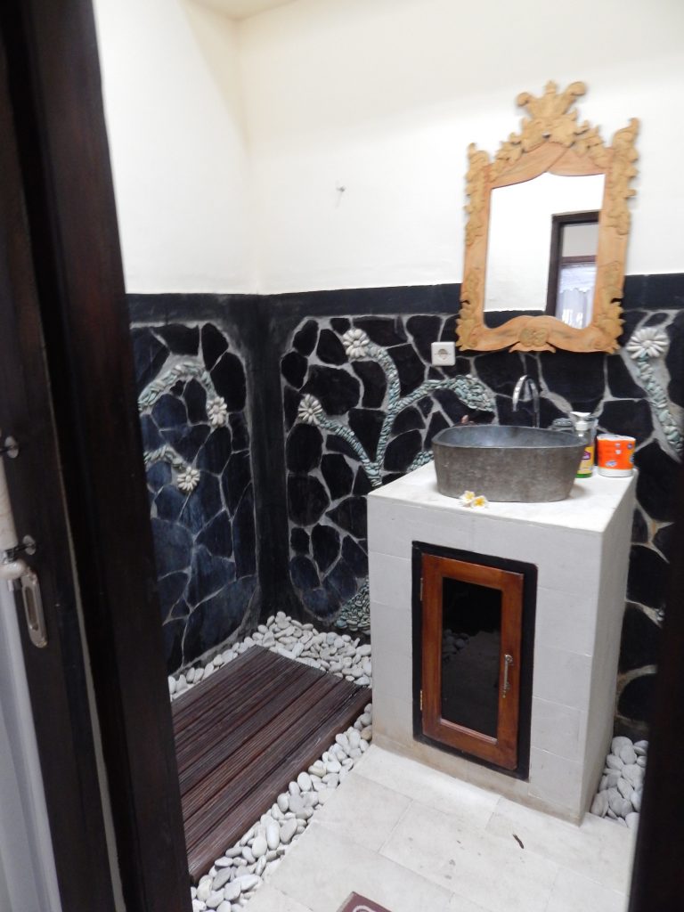 Bathroom inside hotel room at Hotel Suma