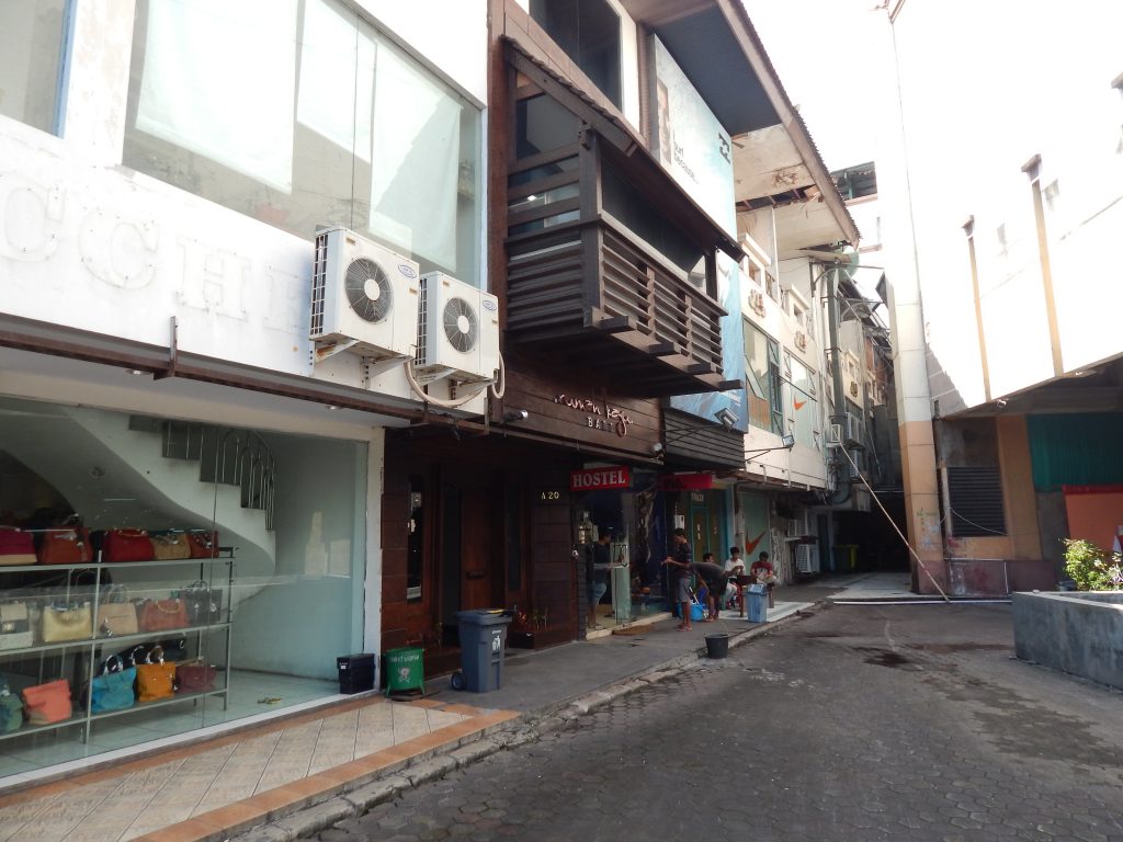 Entrance of Rumah Kayu hostel in Kuta