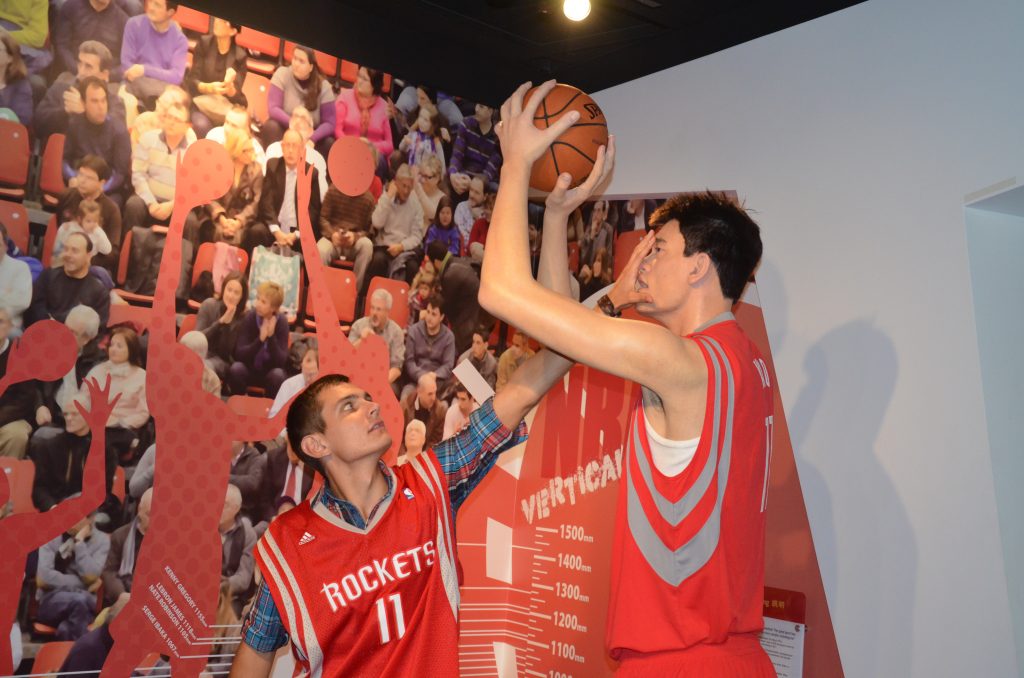 Daniel playing a game of basket ball at Madame Tussaud's, Sydney